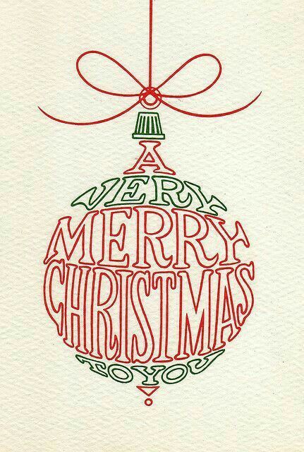 a christmas ornament with the words merry christmas written in red and green ink