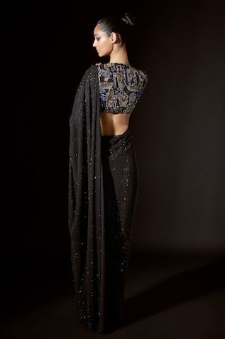 Black net pre-stitched saree with crystal embellishments. Comes with a silver blouse. - Aza Fashions Fitted Black Draped Saree, Semi-stitched Pre-draped Saree With Mirror Work For Evening, Semi-stitched Mirror Work Pre-draped Saree For Evening, Evening Draped Blouse Piece With Mirror Work, Embellished Semi-stitched Draped Blouse Piece, Embellished Draped Semi-stitched Blouse Piece, Fitted Draped Blouse Piece With Sequins, Fitted Embellished Draped Blouse, Embellished Fitted Draped Blouse