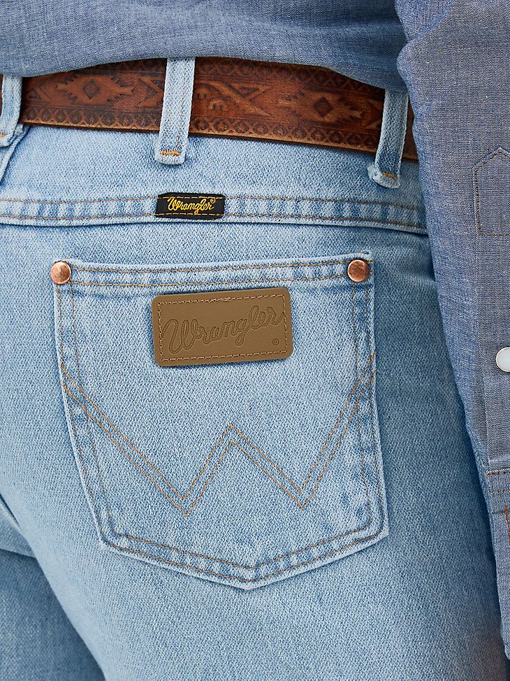 FINALLY, JEANS THAT FIT LIKE A GLOVEWrangler® Cowboy Cut® jeans are a tried-and-true wardrobe staple for cowboys who demand a lot from their everyday clothes. Our men's Cowboy Cut® 0936 comes with all the same iconic details of the 13MWZ, including the classic neolite patch, five-pocket styling, and that signature 'W' stitching you know and trust. What makes the 0936 jean a must-have for every modern cowboy is its slim silhouette through the seat, thigh, and knee. Whether dressed up for a special occasion or dressed down for a backyard barbecue, these men's Cowboy Cut® Wrangler jeans will keep you comfortable all day long without compromising style.Look for the W on the Pocket® Cowboy Cut Jeans, Wrangler Cowboy, Modern Cowboy, Wrangler Cowboy Cut, Mens Cowboy, Everyday Clothes, Backyard Barbecue, Wrangler Jeans, Jeans Mens