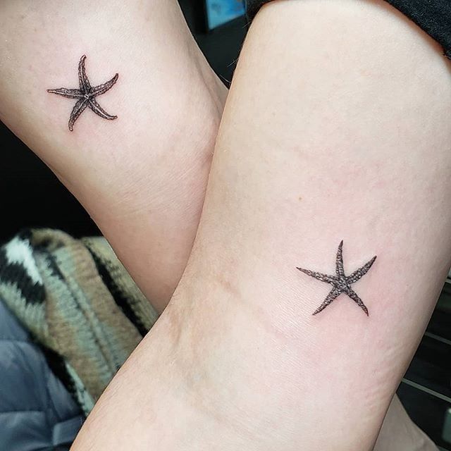 two starfish tattoos on both legs