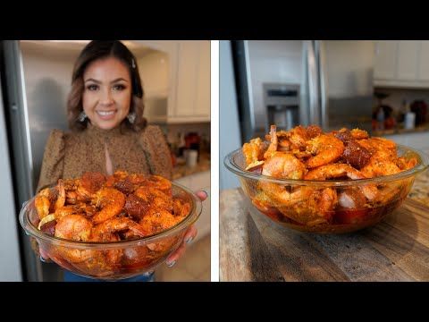 a woman holding a glass bowl filled with food