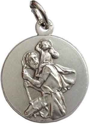 a silver medal with an image of a man holding a woman