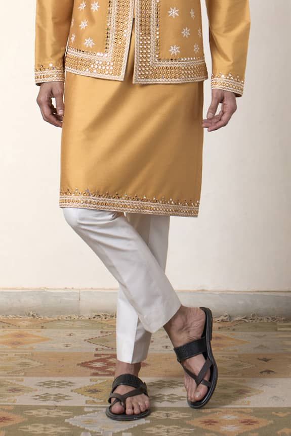 Mustard bundi featuring thread embroidered floral blossom patterns with mirrorwork embellishments. Comes with kurta and pyjama pant. - Aza Fashions Eid Raw Silk Nehru Jacket With Mirror Work, Eid Nehru Jacket With Mirror Work In Raw Silk, Traditional Nehru Jacket With Gota Work For Festive Occasions, Eid Nehru Jacket In Raw Silk With Mirror Work, Diwali Nehru Jacket With Gota Work, Festive Traditional Nehru Jacket With Gota Work, Fitted Nehru Jacket With Zari Work For Spring, Ceremonial Bandhgala With Gota Work, Bollywood Style Ceremonial Bandhgala With Gota Work