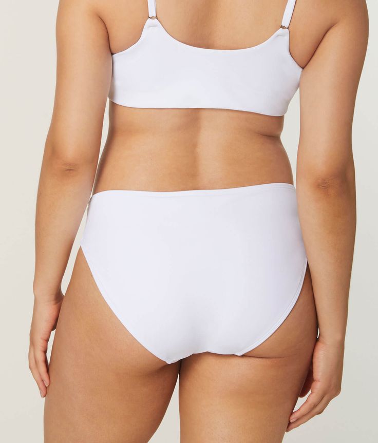 Our most versatile low rise bottom. A classic fit, made to mix or match.FIT EXPERTS SAY:"Makes my legs look longer!" Seamless White Bottoms With 4-way Stretch, White Seamless 4-way Stretch Bottoms, White Bottoms With Contoured Waistband And 4-way Stretch, Classic Brief Bottoms In Elastane, White Smoothing Elastane Bottoms, White Smoothing Full Coverage Bottoms, White Smoothing Bottoms, Classic Elastane Brief Bottoms, Casual Nylon Brief Bottoms