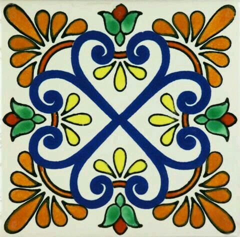 a blue and orange tile with an ornate design