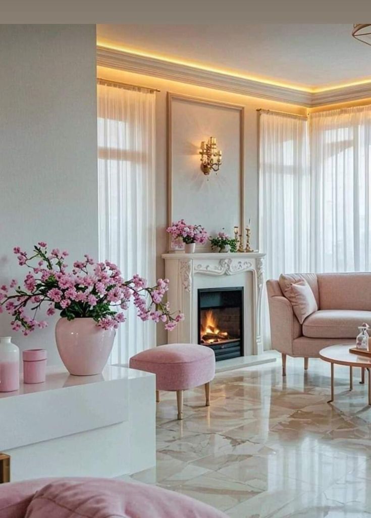 a living room filled with furniture and a fire place next to a window covered in curtains