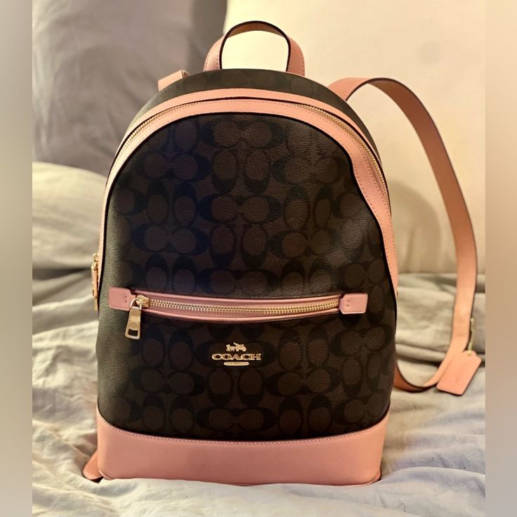 Nwot-Mint Condition Classic Coach, Emblem, W Pale Pink/ Peach Leather Accent. It's Very Very Sturdy At Lightweight Compartments For Your Convenience. There Are Two Black Inside To Hold Water Bottles,Deodorant... 2 Small Black Dots Inside, Bottom Of Bag. No Idea. Havent Used It.. Nearly Perfect Condition. As Is. If I Find Tags Ill Lyk & Include W Receipt. Classy, When Needing A Smaller Yet Surprisingly Capable Backpack. H: ~13.33", L: ~ 11.5", W (Fluctuates When Filled) Btw 5"-6.2" Much Love To M Coach Book Bag, Women’s Backpacks, Mochila Coach, Funny Spanish Jokes, Luxury Backpack, Coach Backpack, Funny Spanish, Spanish Jokes, Sunflower Daisy