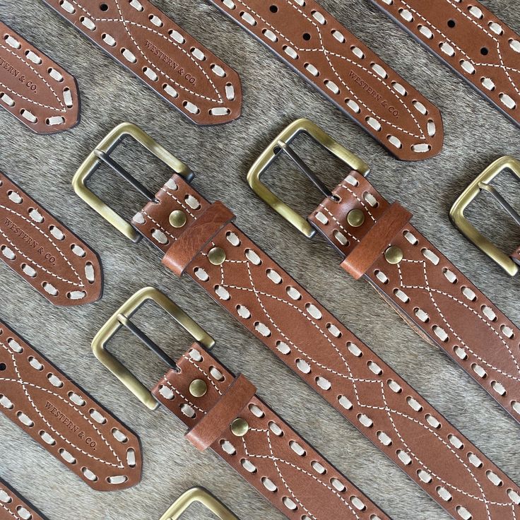 A classic leather belt is a closet staple for a reason, and our unisex version features embroidered western detailing and a buckstitch design. Built to be worn nine to five and five to last call, it’s just as cute with jeans as it is cinched around the waist of your favorite dress. Comes with Chicago screws and a brass buckle that can easily be switched out for your favorite statement-making buckle. Designed right here in the USA for cowgirls everywhere. Details: Composition: Leather with brass Fort Worth Stockyards, Nine To Five, Chicago Screws, Brass Belt Buckles, Brass Buckle, Closet Staples, For A Reason, Last Call, Classic Leather