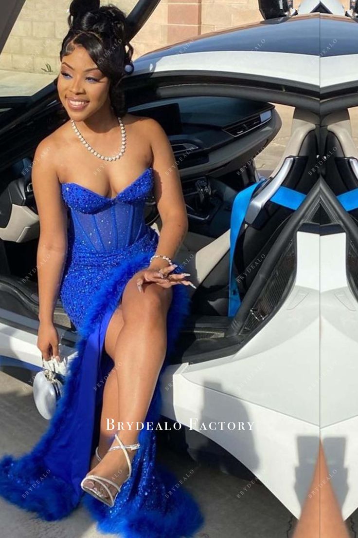 Royal Blue Sequin Corset Feather Slit Prom Dress. Strapless sweetheart illusion corset with exposed boning. Stylish mermaid skirt, adorned with feathers and a sexy high slit. Prom Dress With Corset On Top, Accessories On Dress, Blue And Grey Prom Dress, Strapless Royal Blue Dress, Royal Blueprom Dress, Long Blue Homecoming Dresses, Blue Md Dresses, Prom Look Ideas, Royal Blue Prom Dresses Corset