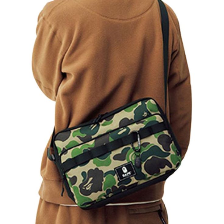 Discover the new edition of the coveted Bape messenger bag. It is a high quality Oxford messenger bag available at the best price on our store. Fall in love with this trendy shoulder bag and carry your daily essentials and your 13 inch laptop. The perfect bag for students, professionals and your outings. The Bape messenger bag will become your best fashion accessory The 2021 edition of the Bape messenger bag is coming to us! Both elegant and practical, this designer messenger bag from Bape is on Designer Messenger Bag, Trendy Shoulder Bag, New Edition, Daily Essentials, Messenger Bags, Perfect Bag, Best Fashion, Fall In Love, Carry On