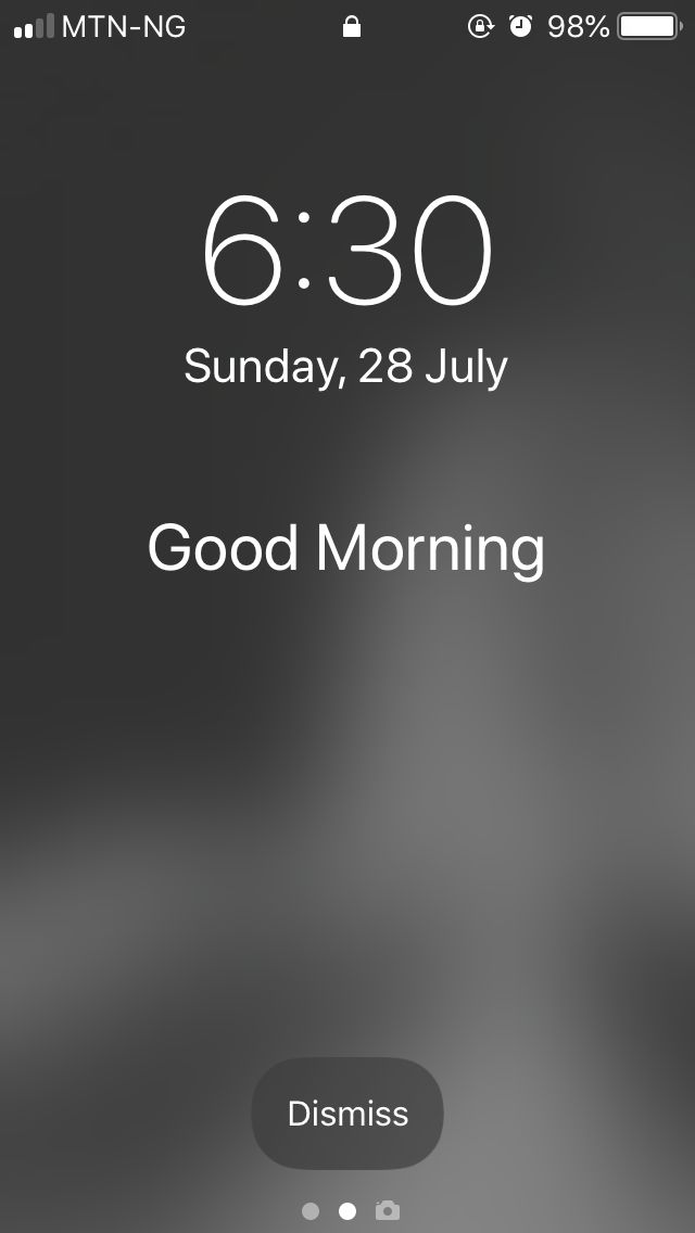 an iphone screen with the message good morning and 6 30 pm on it's display