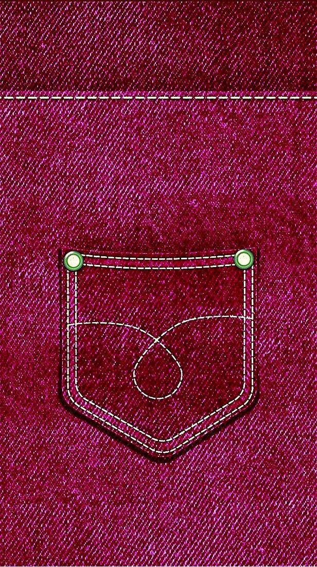 the pocket of a red jean pants with white stitching and a button at the bottom