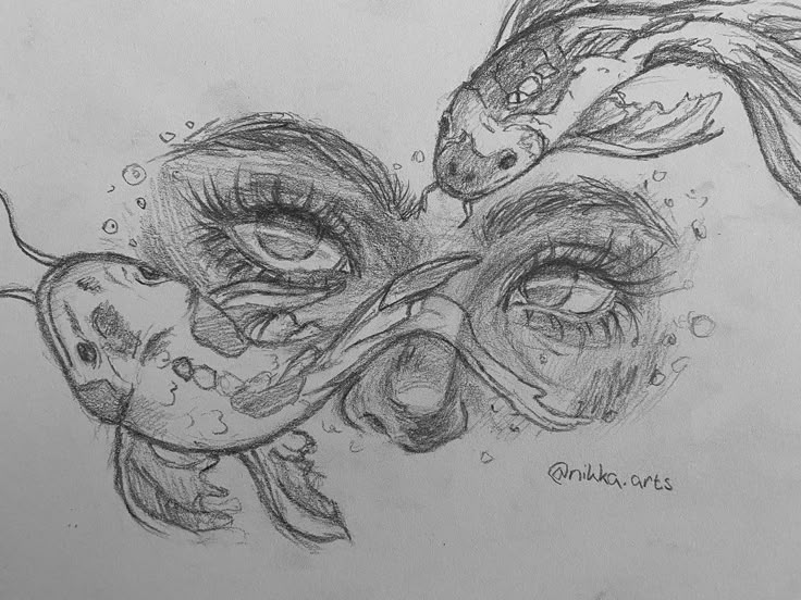 a pencil drawing of two fish swimming next to each other