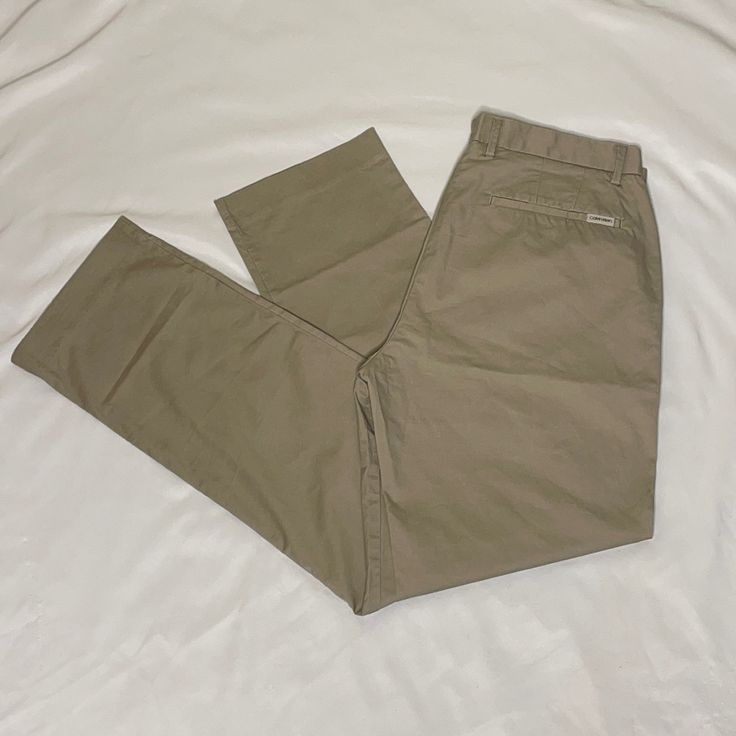 These Are Brand New Condition Size 33x30 Casual Flat Front Bottoms For Fall, Classic Beige Mid-rise Bottoms, Classic Mid-rise Beige Pants, Classic Beige Mid-rise Pants, Casual Brown Flat Front Bottoms, Classic Brown Bottoms For Everyday, Casual Flat Front Work Pants For Spring, Calvin Klein Cotton Straight Leg Pants, Calvin Klein Wide Leg Pants With Pockets