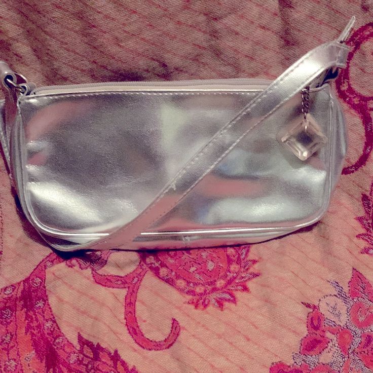 Brand New! Never Used! 3” Tall 9” Wide Silver, Black Inside. Elegant Victoria's Secret Party Bags, Chic Victoria's Secret Shoulder Bag With Zipper Closure, Chic Victoria's Secret Shoulder Bag With Zipper, Trendy Rectangular Victoria's Secret Shoulder Bag, Victoria's Secret Rectangular Shoulder Bag For Evening, Victoria's Secret Elegant Rectangular Shoulder Bag, Trendy Victoria's Secret Evening Bag, Victoria's Secret Rectangular Evening Shoulder Bag, Elegant Victoria's Secret Rectangular Shoulder Bag