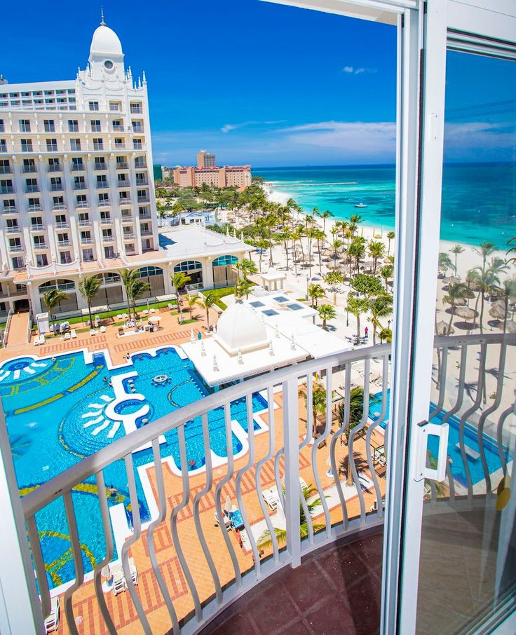 the view from an ocean front hotel balcony