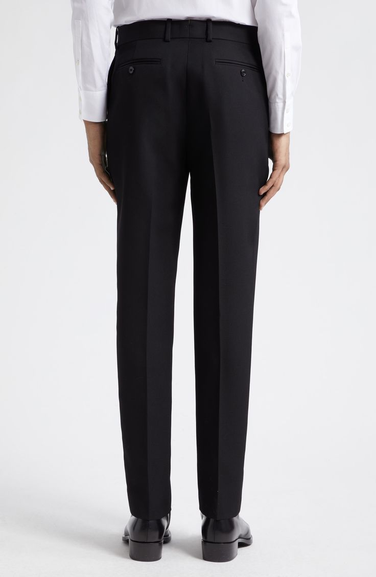 Tailored elegance pervades Italian-crafted pants fashioned from smooth wool with a mid rise and cleanly pressed creases. 34" inseam; 14 1/2" leg opening; 11 1/2" front rise; 14 1/2" back rise (size 48 EU) Zip fly with hook-and-bar closure Side-seam pockets; back button-welt pockets 100% wool Dry clean Made in Italy Designer Clothing Luxury Straight Leg Dress Pants For Evening, Luxury Tapered Leg Dress Pants For Semi-formal Occasions, Sleek Straight Silhouette Bottoms For Evening, Luxury Tailored Trousers Pantsuit, Office Straight Pants In Suiting Fabric, Luxury Straight Leg Dress Pants For Semi-formal Occasions, Sleek Straight Silhouette Pants With Pressed Crease, Sleek Straight Pants With Pressed Crease, Elegant Straight Silhouette Bottoms For Evening