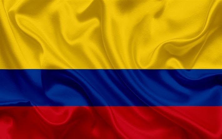 the flag of colombia waving in the wind