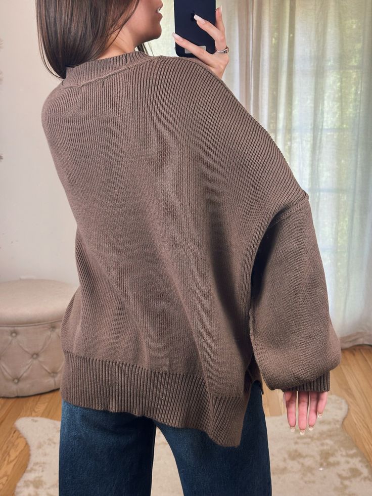 High Quality oversized Knit Sweater ft. Thick Edge Stitching and Drop Shoulder! Maclaine is 5'7 wearing a size SMALL. This is naturally oversized! Available in Black, Chocolate & Cream! 60% cotton 40% acrylic Oversized Chunky Knit Loungewear Top, Oversized Chunky Knit Top For Loungewear, Oversized Soft Knit Turtleneck Sweater, Slouchy Textured Knit Sweater For Fall, Oversized Chunky Knit Sweater For Loungewear, Oversized Turtleneck Outerwear For Cold Weather, Winter Chunky Knit Top One Size, Oversized Knit Sweater For Loungewear, Chunky Knit Winter Top