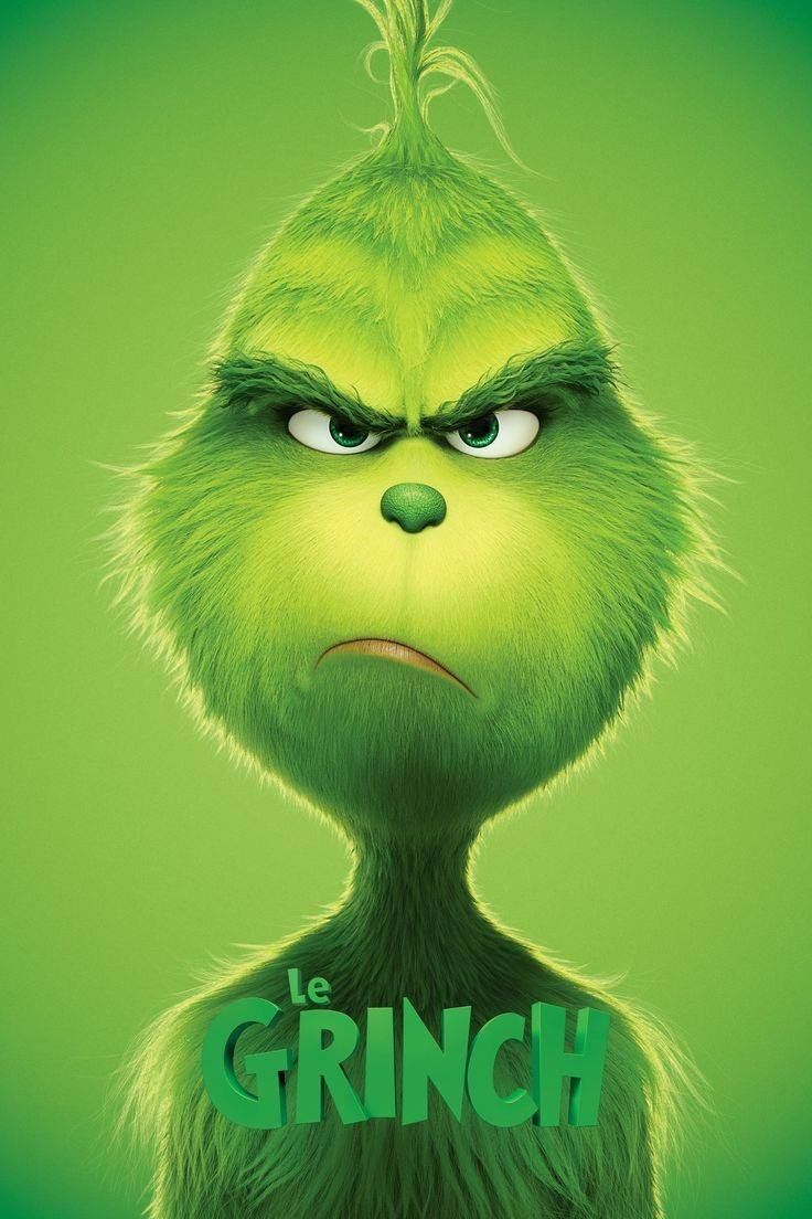 the grin movie poster is shown in green and has an angry look on it's face