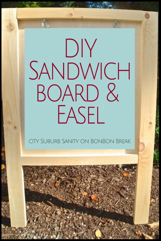 a sign that says diy sandwich board and easel in front of some leaves