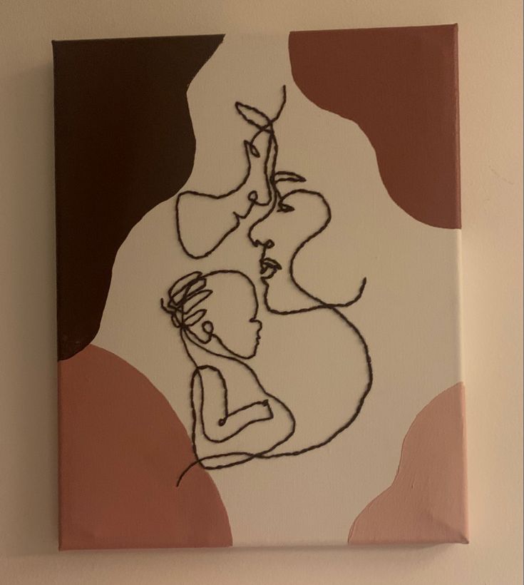 a painting on a wall with a woman kissing a man's head in the middle