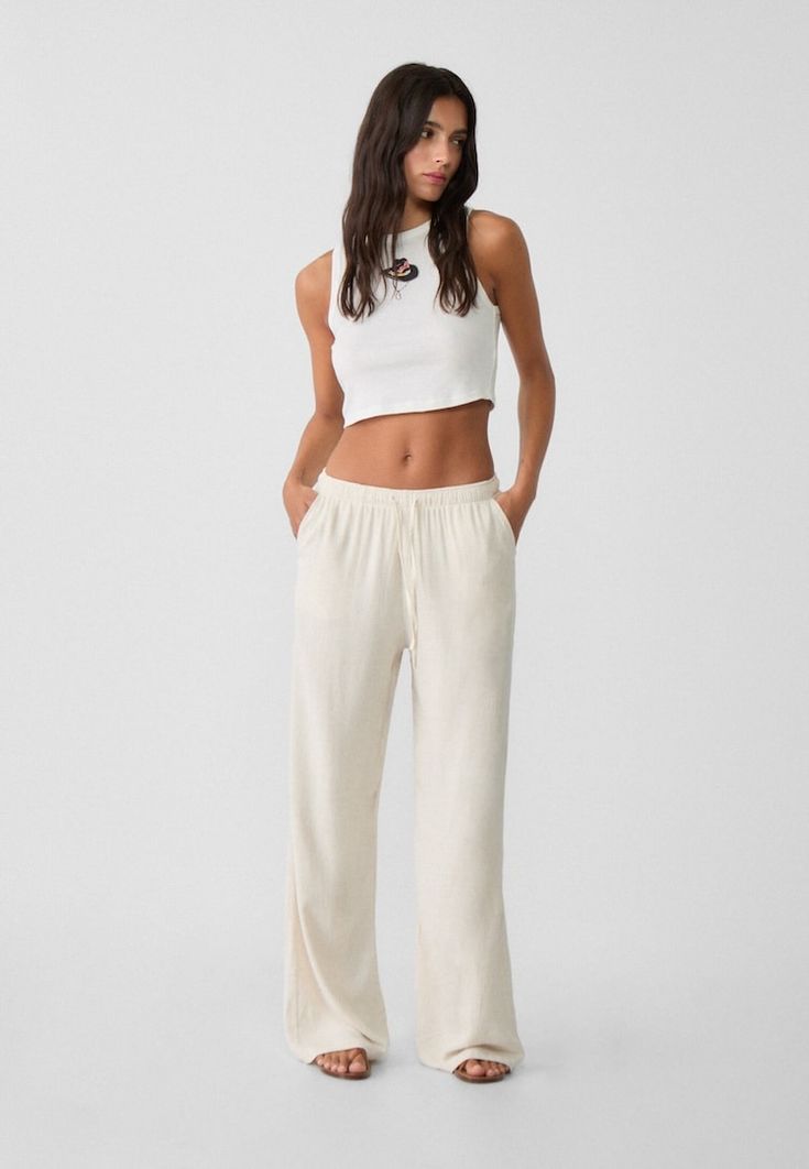 Loose-fitting linen blend trousers - Women's fashion | Stradivarius United States Chic Cotton Sweatpants, Chic Linen Bottoms With Elastic Waistband, Wide-leg Viscose Pants With Pockets, Chic Linen Bottoms For Loungewear, Chic Linen Loungewear Bottoms, Linen Loungewear Bottoms Long Pants, Viscose Wide-leg Pants With Pockets, Linen Long Pants For Loungewear, Linen Pants With Elastic Waistband For Loungewear