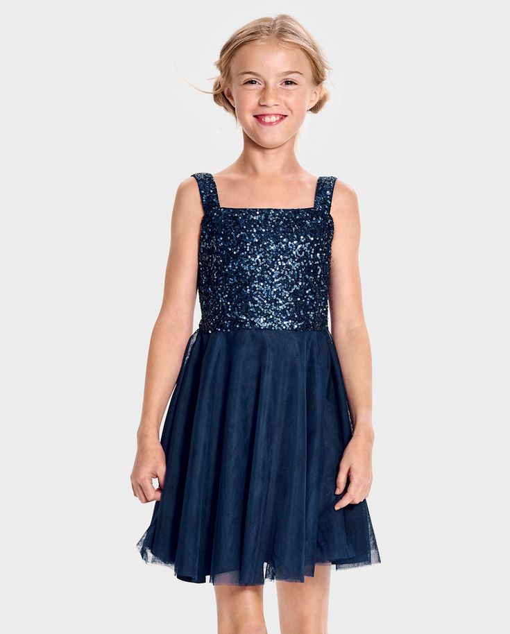 FABRICATION: 100% polyester sequins bodice & top straps, 100% polyester mesh skirt, 100% polyester interlock bottom straps & bodice lining, 100% polyester satin skirt lining, imported FIT & DESIGN: Square neck, sleeveless, above-knee length CLOSURE: Zipper-back FEATURES: Sequin bodice. Girls Sleeveless Sequin Mesh Fit & Flare Dress | The Children's Place Girls Sequin Mesh Fit & Flare Dress | Size 14 | Blue Matching Christmas Outfits, Girls Sweater Dress, Skirt Lining, Top Straps, Bodice Top, Design Square, Mesh Skirt, Satin Skirt, Polyester Satin