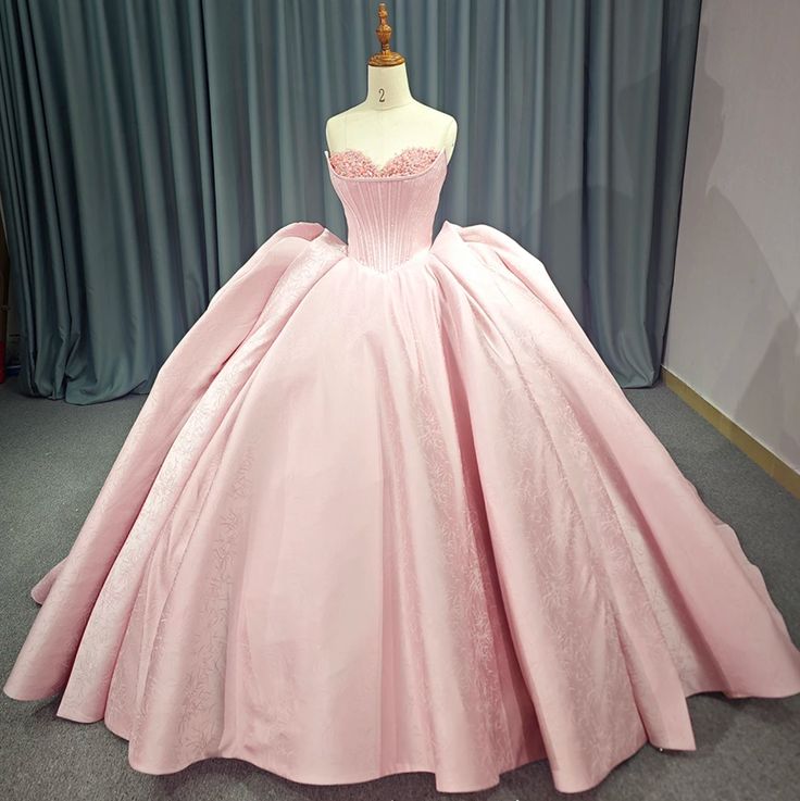 Pink Strapless Satin Quinceanera Dress Strapless Quinceanera Dress For Debutante Ball, Satin Ball Gown Dresses For Quinceanera, Satin Quinceanera Dress With Sweetheart Neckline, Quinceanera Satin Ball Gown, Corset Dress With Sweetheart Neckline For Quinceanera, Strapless Ball Gown With Boned Bodice For Debutante Ball, Satin Dress With Sweetheart Neckline For Quinceanera, Sweetheart Neckline Corset Dress For Quinceanera, Quinceanera Ball Gown Evening Dress With Corset Back