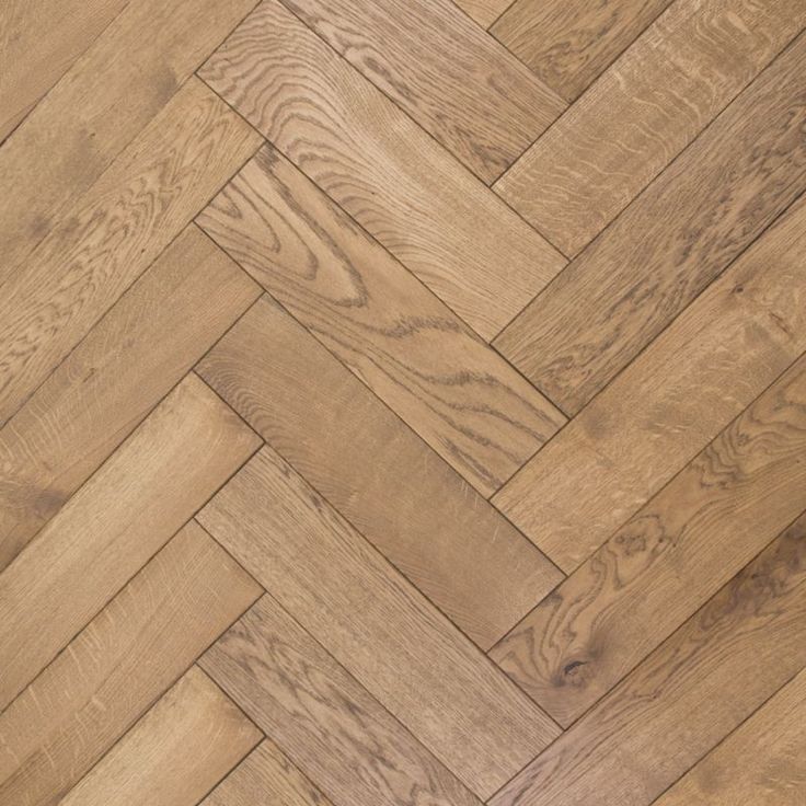 an image of wood flooring that looks like it is made out of herringbones