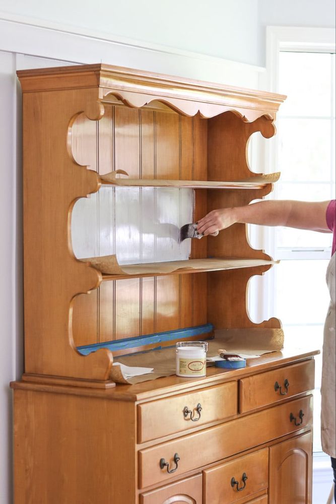 Painting the first coat of chalk paint on the back of the hutch. Painted Hutch Ideas, Chalk Painted Hutch, Chalk Paint Hutch, Chalk Paint Furniture Tutorial, Hutch Redo, Bookcase Makeover, Painted Hutch, Chalk Paint Furniture Diy, Hutch Makeover