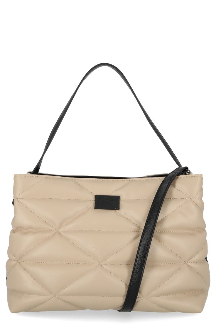 Geometric quilting adds textural intrigue to a spacious shopper bag furnished with a divided interior perfect for organizing your essentials while on the go. Magnetic-snap closure Shoulder straps; removable, adjustable crossbody strap Dual interior compartments with center zip-pocket divider; interior zip and wall pockets Lined Polyurethane Imported Everyday Beige Quilted Bags, Versatile Quilted Beige Bag, Beige Quilted Shoulder Bag For Travel, Quilted Beige Shoulder Bag For Travel, Quilted Tote Shoulder Bag For Everyday Use, Beige Quilted Shoulder Bag For Daily Use, Quilted Double Handle Shoulder Bag For Everyday, Quilted Leather Bag With Top Handle For Everyday Use, Quilted Satchel Bag For Everyday Use