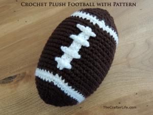 a crochet football hat sitting on top of a wooden floor with the words crochet flush football with pattern