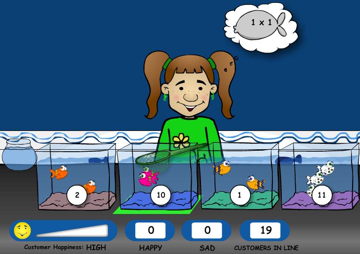 a girl standing in front of an aquarium filled with fish