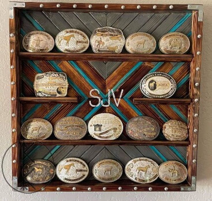 a wooden display case filled with different types of coins