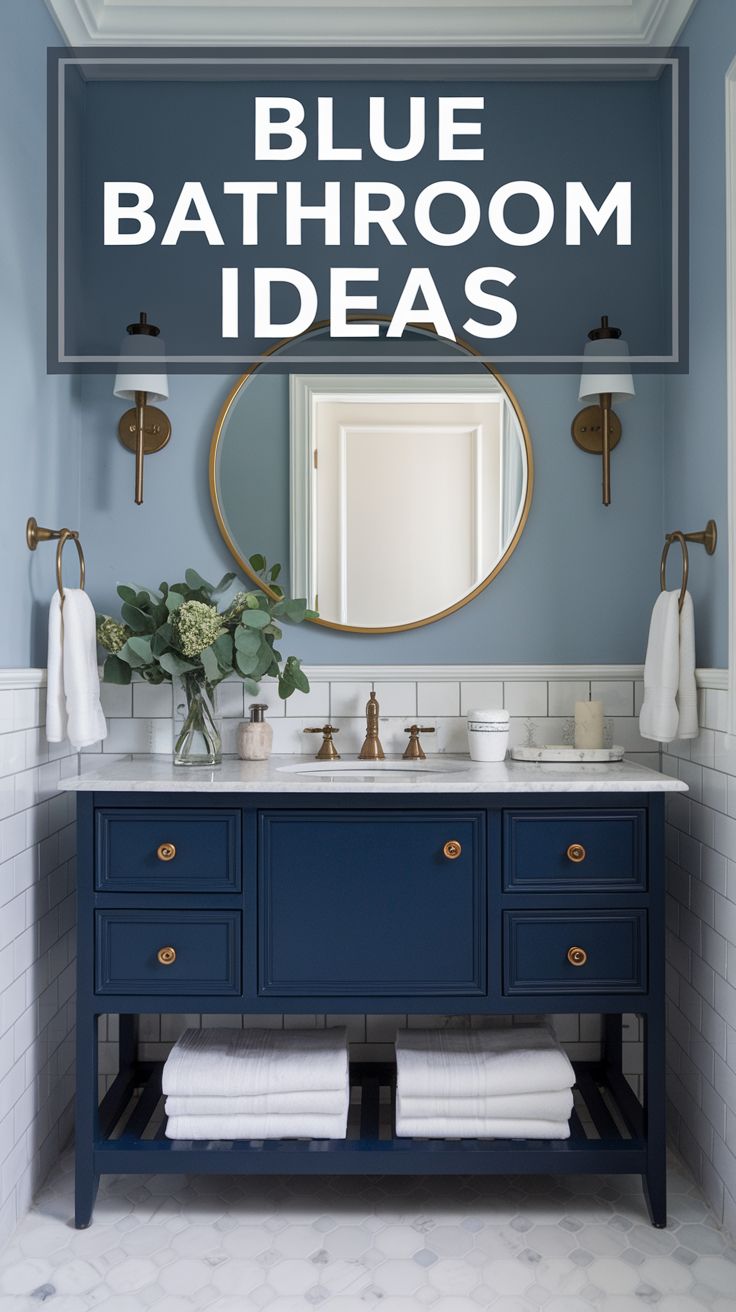 a bathroom with blue cabinets and white towels on the counter, and a sign above it that says blue bathroom ideas