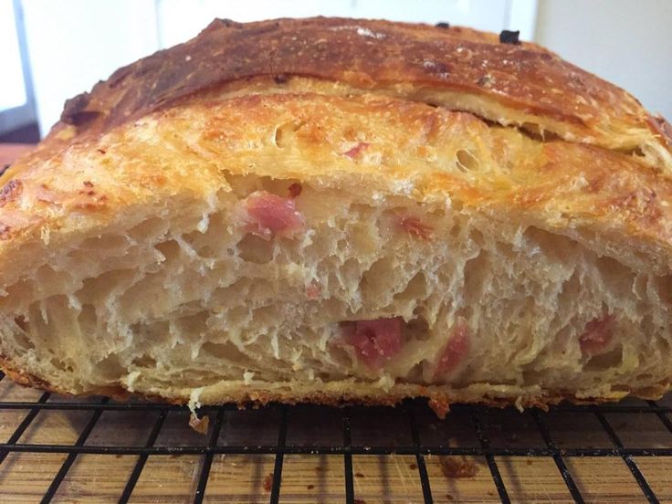 a loaf of bread sitting on top of a cooling rack