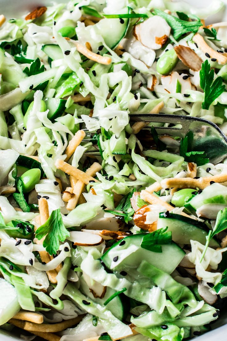 a close up of a salad in a bowl