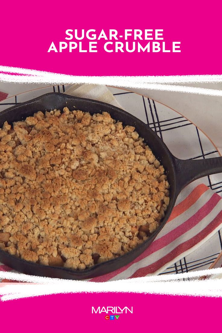 a large skillet filled with crumbled food on top of a pink and white plate