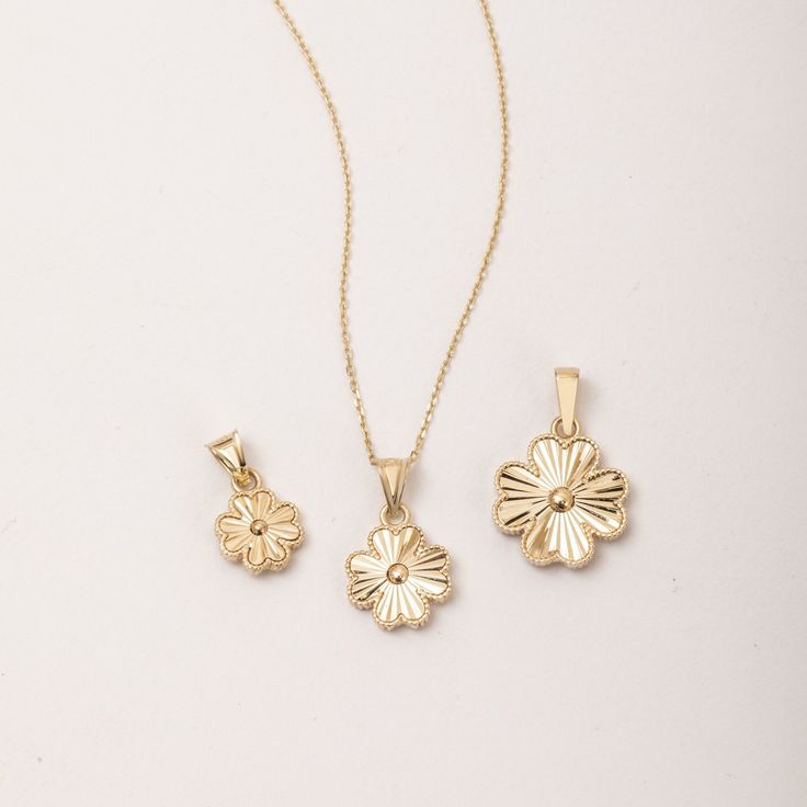 4 Leaves Clover Pendant Necklaces in 14K Solid Yellow Gold, Dainty Fluted Clover Pendant Clover Jewelry, Ballerina Clover Necklace Birthday Gift, ► Adding a customized tiny bar at clasp may be a good idea: https://etsy.me/3cn9OQ5 Material: Real Solid Gold - Not gold plated - Not gold filled  Gold Karat: 14K (585) Gold Color: Yellow Available star size: 8.5 mm, 10.5 mm, 13.5 mm   M o r e  *  F r o m  *  U s   Goldstore Jewelry - https://etsy.me/3gHtcrZ * Editor's Pick - https://etsy.me/3CCLlmm * Cremation Urn Jewelry - https://etsy.me/3MM0Lcq * Diamond Necklace - https://etsy.me/3CCj8vM * Emerald Necklace - https://etsy.me/3t55NZM * Pearl Necklace - https://etsy.me/3t1YeDf * Star Necklace - https://etsy.me/35WVIp0 * Moon Necklace - https://etsy.me/3q1IluF * Cross Necklaces - https://etsy.me White Gold Tarnish-resistant Jewelry For Mother's Day, Formal Yellow Gold Flower-shaped Jewelry, Yellow Gold Plated Flower Jewelry, Gold Plated Yellow Gold Flower Jewelry, Gold Flower-shaped Jewelry With Birthstone, 14k Gold Filled Diamond Cut Jewelry For Anniversary, Yellow Gold Pendant Jewelry With Flower Charm, Tarnish Resistant White Gold Jewelry For Mother's Day, Gold Jewelry Sets Diamond Cut Gift