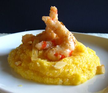 a white plate topped with food on top of a table