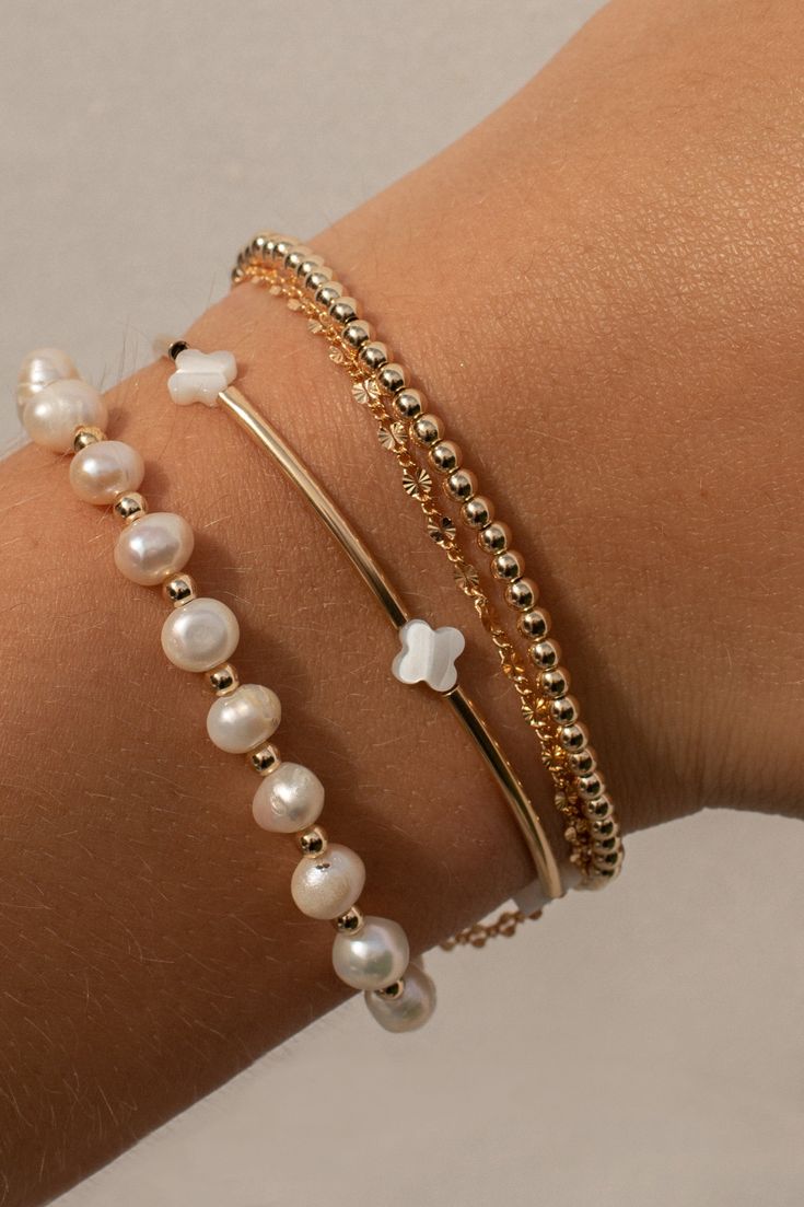 14k gold filled and mother of pearls. Gold Bracelet Stack Aesthetic, Gold Beachy Bracelets For Summer, Gold Bracelet Stacks, Pearl And Gold Bracelet Stack, Elegant Gold Stacked Bracelets, Jewelry Pearl, Gold Bracelet Stack Classy, Mother Of Pearl Bracelet, Summer Gold Stackable Bracelets