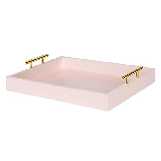 a pink tray with two gold handles on the bottom and one in the middle that is empty