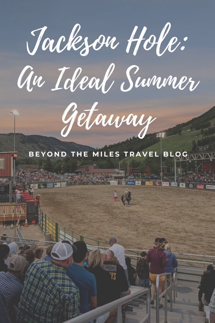 people watching a horse race at sunset with text overlay that reads jackson hole an ideal summer getaway beyond the miles travel blog