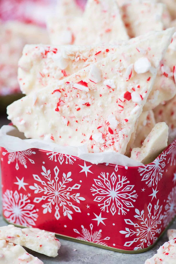 white chocolate and peppermint barkle fudges in a red christmas tin