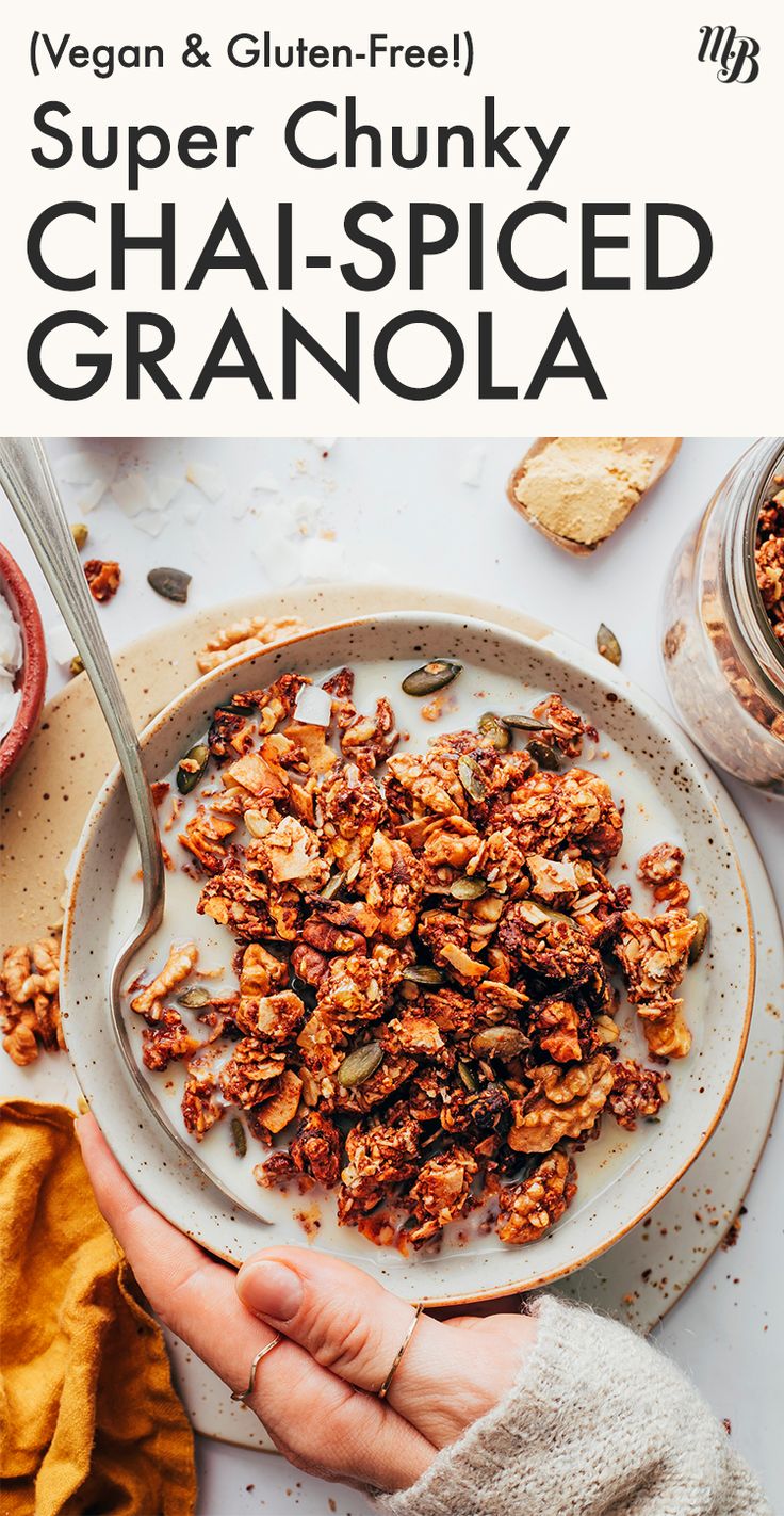 a person holding a plate with granola on it