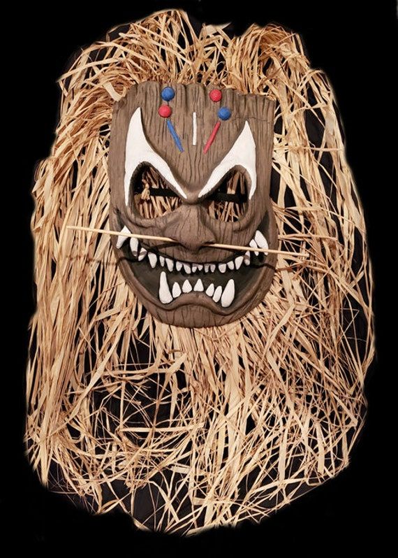 * * * A Halloween-Mask.com Exclusive * * * Searching for a mask to take to a deserted island, tribal ritual or a luau party?  Well, look no further!  Our Evil Tiki mask is equally at home in any of these settings. The mask features a carved wood appearance, tribal decorations, teeth, pierced nose and long grass hair.   Latex face mask with grass hair and strap Made in the USA. Tiki Mask, Witch Doctor, Costume Masks, Costume Mask, Luau Party, Halloween Masks, College Art, Costume Accessories, Ritual