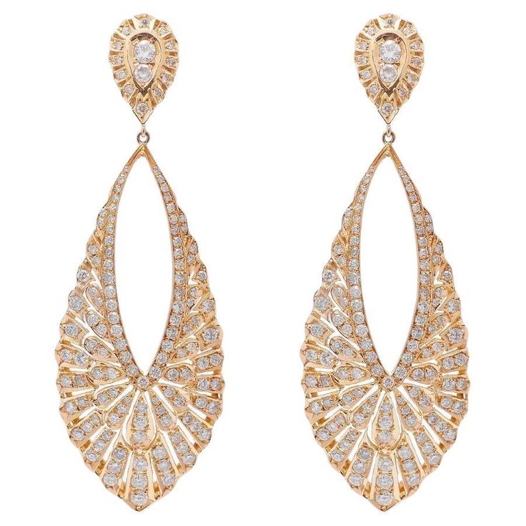 A teardrop design have a timeless, elegant appeal that is highly versatile and suitable for a wide range of occasions. This 18k Rose Gold diamond drop earrings have an elegant, slender vintage look to them. Each teardrop shaped dangle shimmers with a total of 4.45 carat diamonds in an intricate pave design. The dangling drop frames are linked to a pear shape featuring 2 round diamonds and a surrounding pave. Polished to a bright shine, these stylish earrings secure with push backs. Luxury Rose Gold Pear-shaped Earrings, Diamond Dangling Earrings, Art Deco Drop Earrings, Gold Diamond Drop Earrings, Wedding Earrings Studs, Teardrop Diamond, Wedding Studs, Cad Cam, Turquoise Drop Earrings