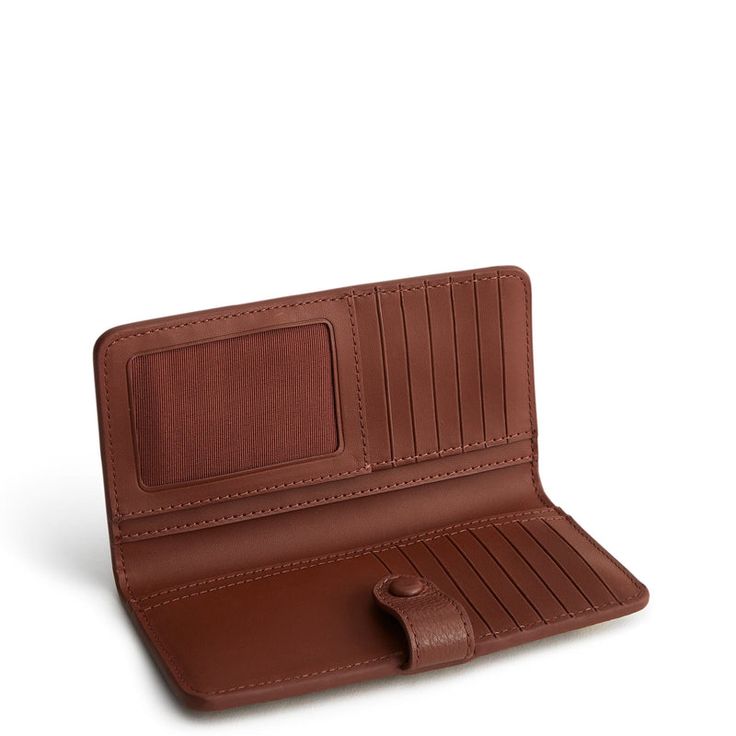 Meet our Tab Wallet, the perfect blend of style, functionality and organization. Crafted from high-quality materials, this spacious wallet offers ample room for your cards, cash, coins and more, keeping everything neatly organized and easily accessible. Whether you're running errands, heading to work or traveling, our wallet offers the perfect combination of functionality, durability and style to meet your everyday carry needs. Vera Bradley Tab Wallet in Pinwheels Green/Orange Fleece Patterns, Backpack Lunch Bag, Card Pouch, Duffel Bag Backpack, Vera Bradley Wallet, Belt Purse, Stocking Stuffer Gifts, Toiletry Bag Travel, Slipper Socks