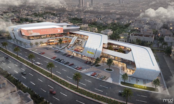 an aerial view of a shopping center in the city